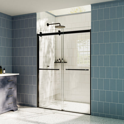 Bathroom with a glass shower enclosure and blue tiled walls