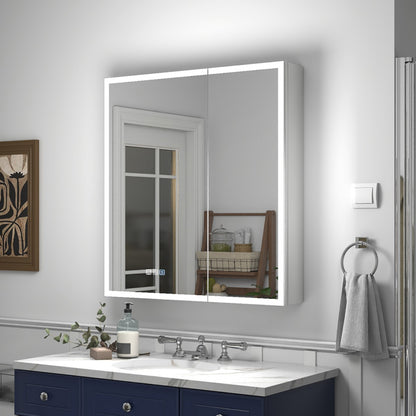 Bathroom with a large illuminated mirror above a sink