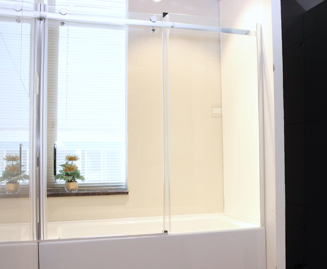 Load video: Zephyr 52-56&quot; Semi-Frameless Single Sliding Tub Door,Chrome,Bypass Bathtub Shower Tempered Glass Door with Explosion-Proof Film