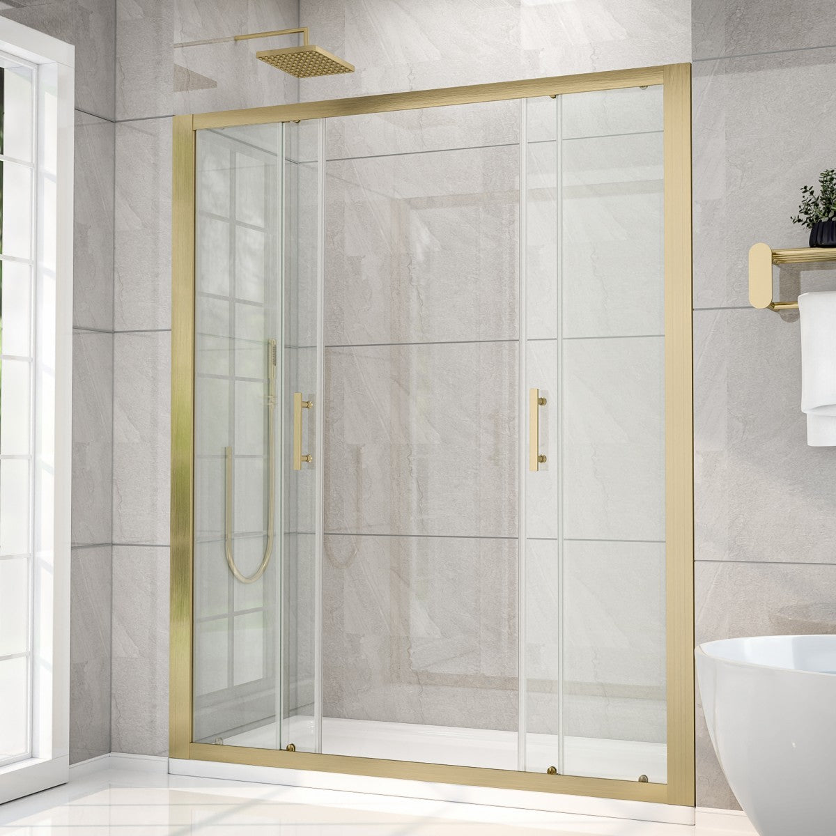 Gold-framed shower enclosure in a bathroom with tiled walls and a window.