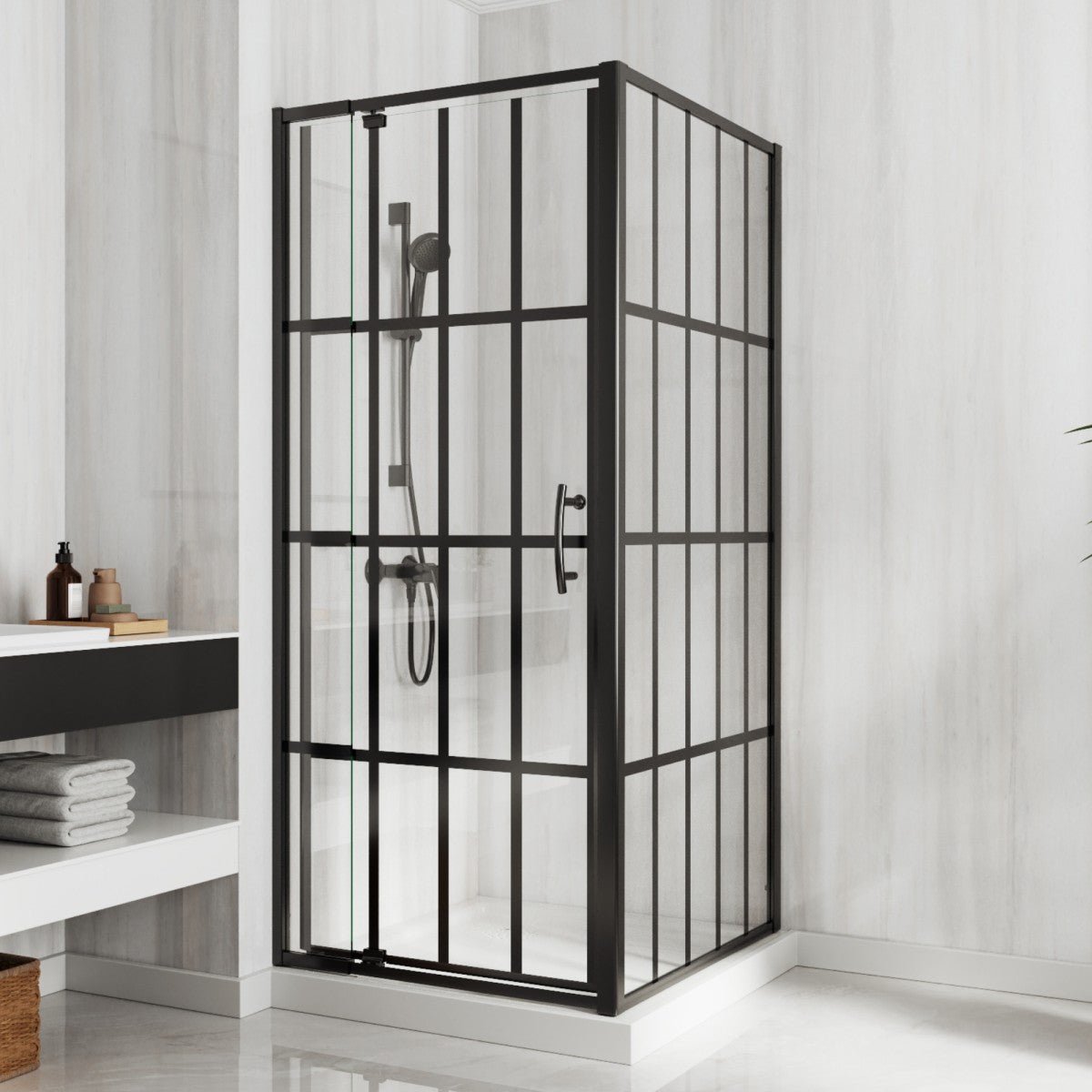 Corner shower enclosure with black metal frame and glass panels in a bathroom setting.