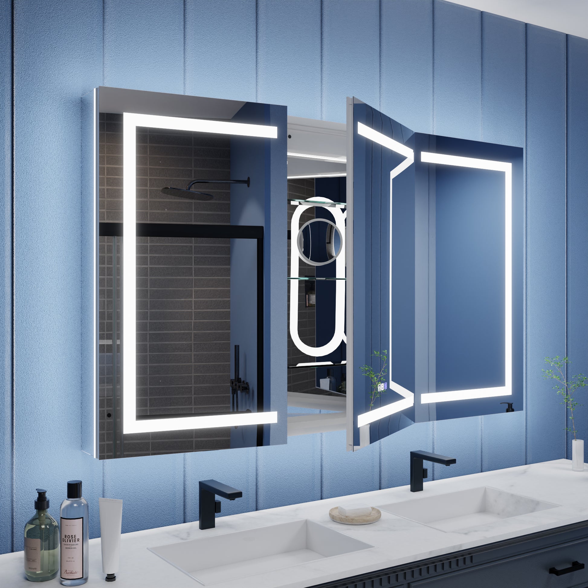 Bathroom vanity with illuminated mirrors and blue wall panels.