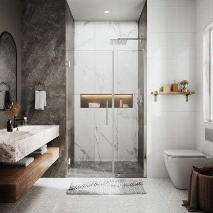 Modern bathroom with shower enclosure, sink, and toilet.