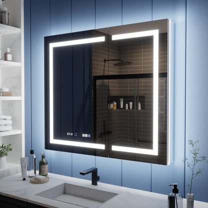 Bathroom with a large illuminated mirror above a sink, featuring various toiletries on shelves.