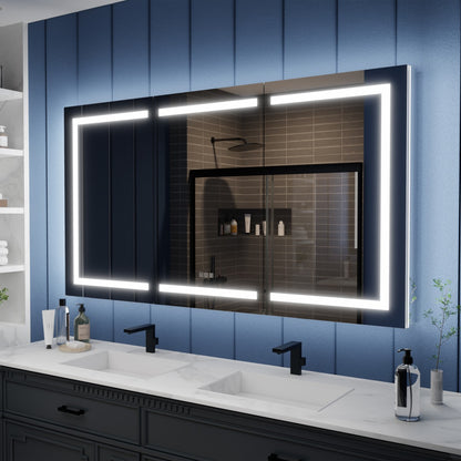 Bathroom vanity with a large illuminated mirror against a blue paneled wall.