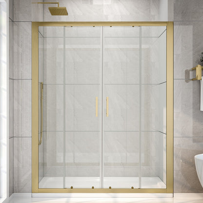 Gold-framed shower enclosure in a bathroom with tiled walls.