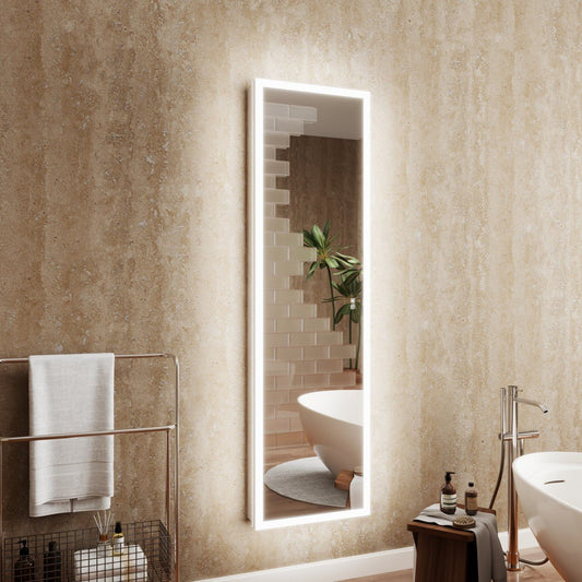 Bathroom with a large illuminated mirror, towel rack, and sink.