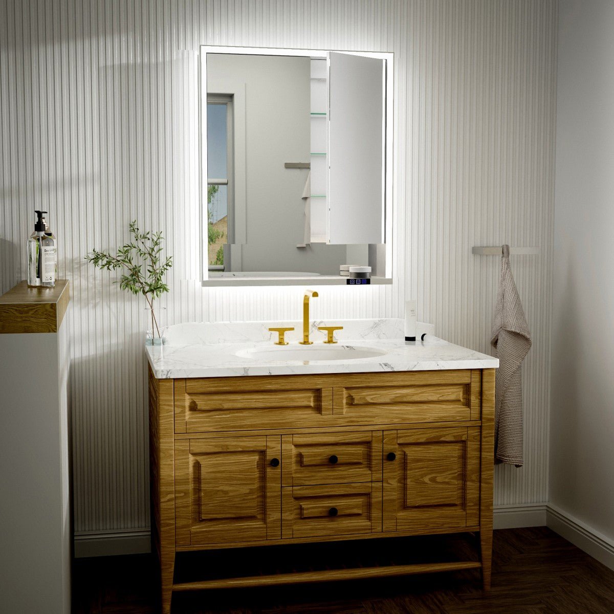 Bathroom vanity with wooden cabinet, white countertop, and illuminated mirror.
