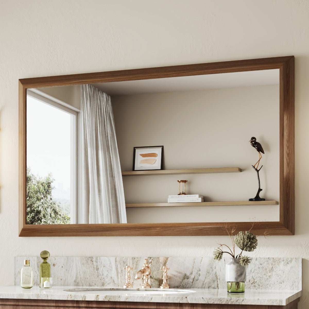 Large wooden-framed mirror on a wall with shelves and decor.