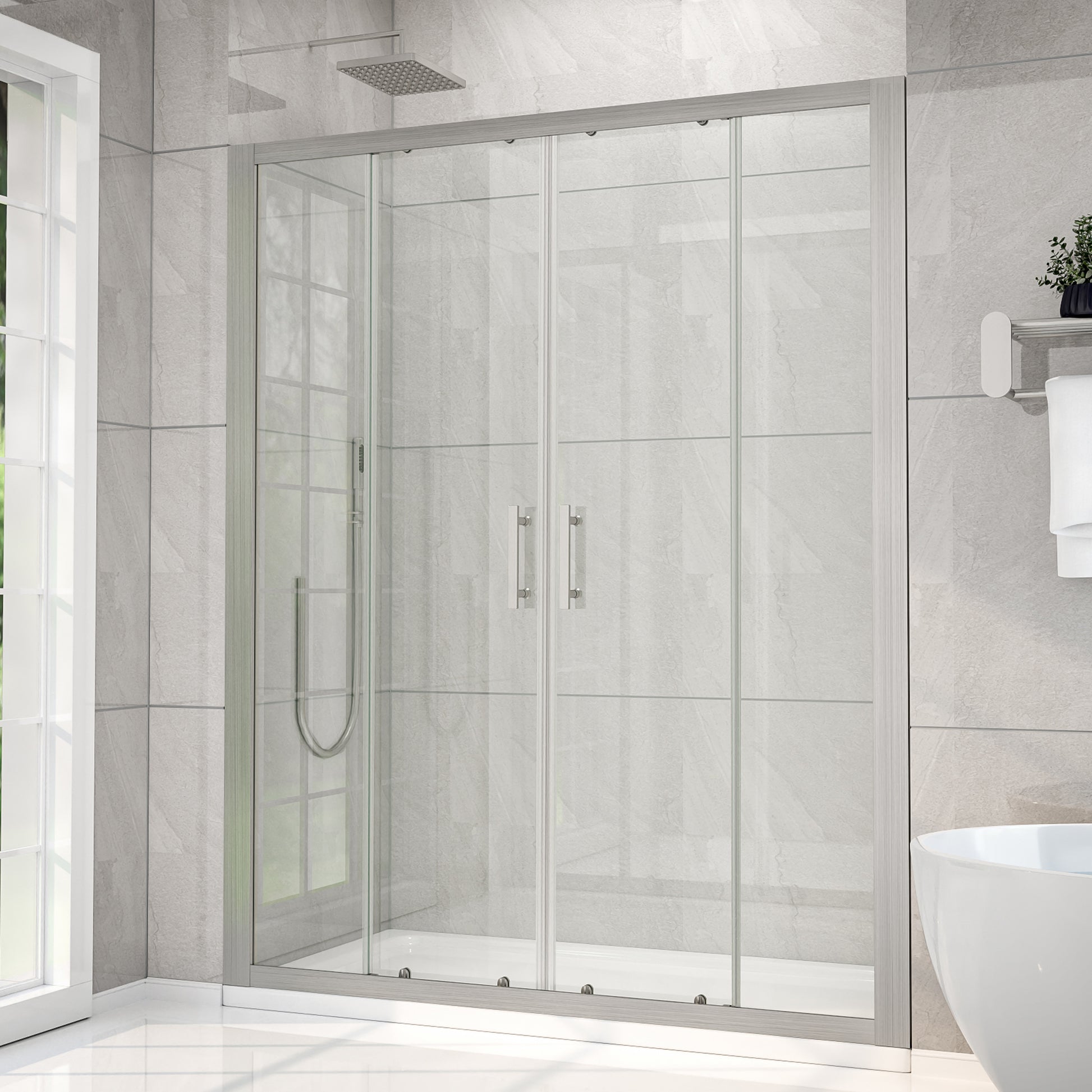 Modern shower enclosure in a bathroom with tiled walls and a window.