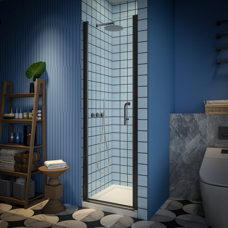 Classy 24-26" small clear glass shower door with hinged pivot and black frame installed in modern bathroom.