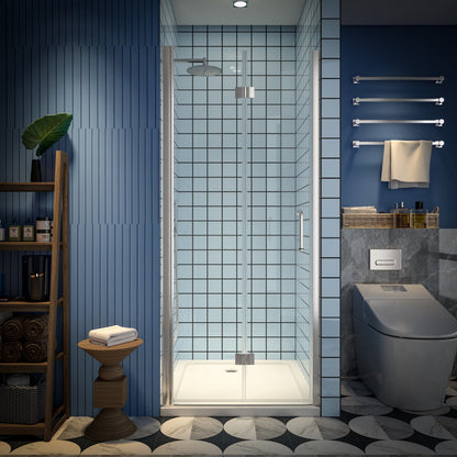 Bifold shower door with brushed nickel finish, tempered glass, and pivot swing mechanism in a modern bathroom setting.