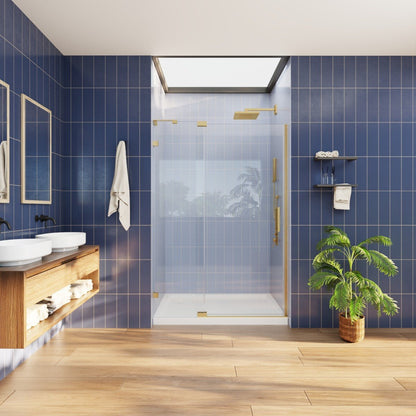 Modern bathroom with blue tiled walls, wooden vanity, and glass shower enclosure.
