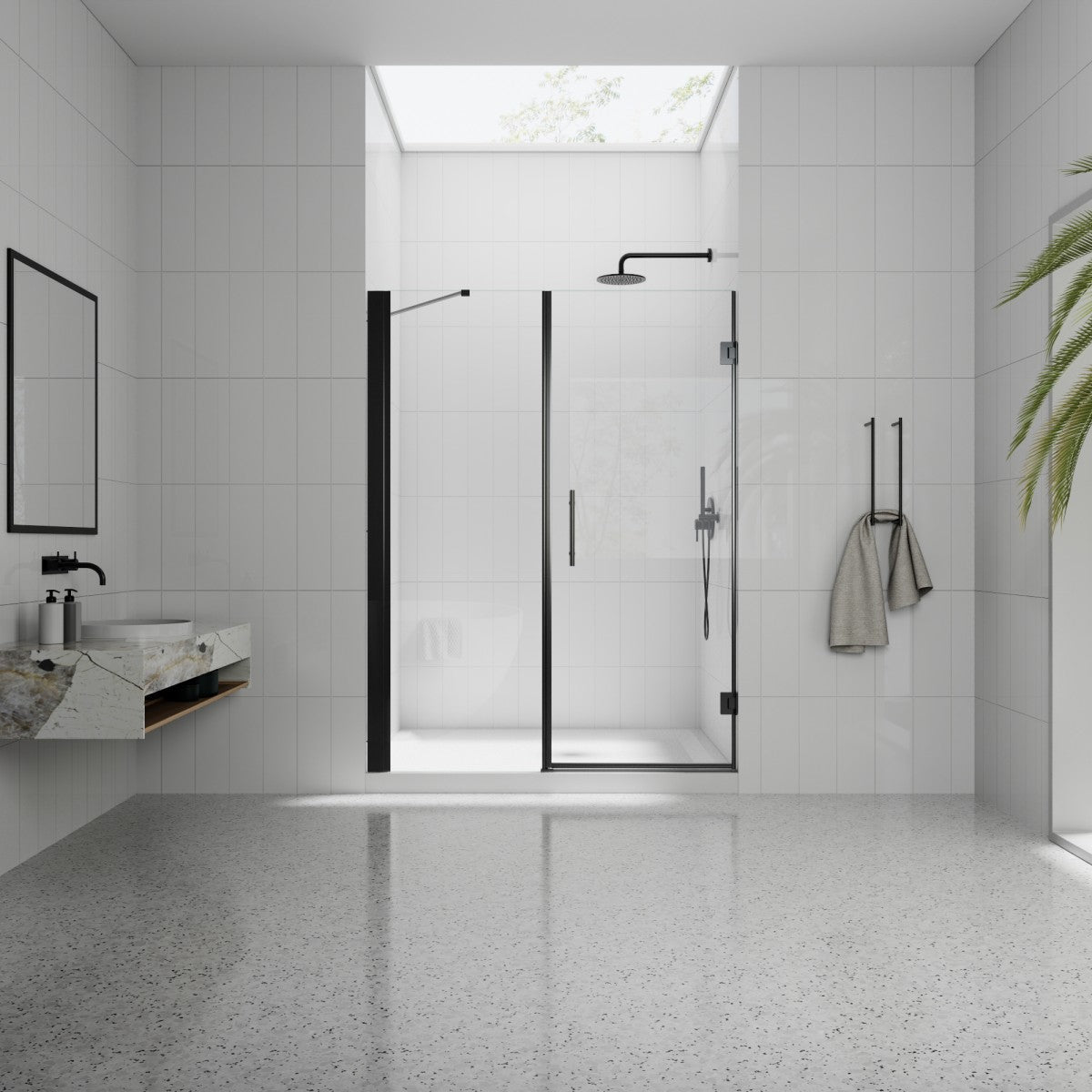 Modern bathroom with shower enclosure, sink, and towel rack.