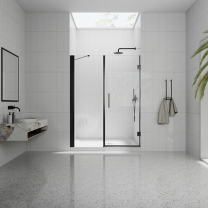 Modern bathroom with shower enclosure, sink, and towel rack.