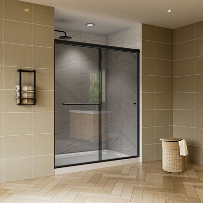 Modern bathroom with a glass shower enclosure, tiled walls, and a basket.