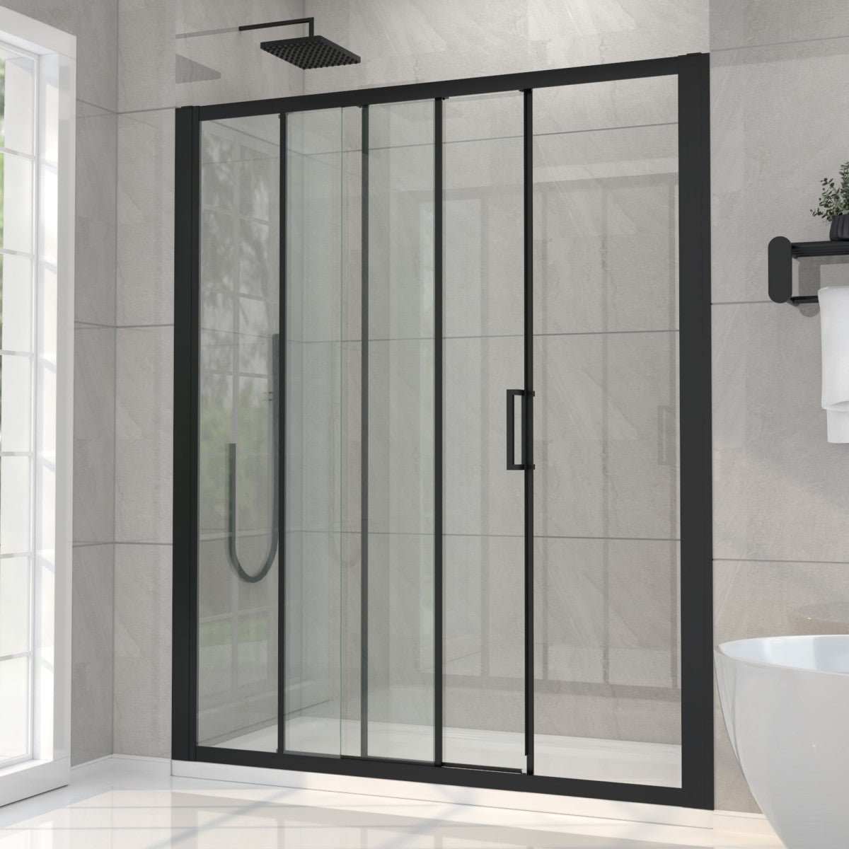 Modern shower enclosure with black frame and glass door in a bathroom setting.